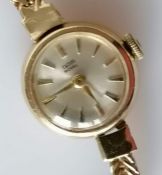 A mid-century ladies Tudor Royal cocktail watch with a 9ct gold herring bone-design bracelet strap