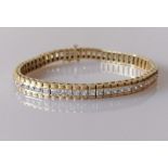 A 9ct gold tennis or line bracelet with square-cut synthetic gems, 18.5 cm, hallmarked, 19g