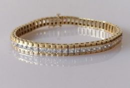 A 9ct gold tennis or line bracelet with square-cut synthetic gems, 18.5 cm, hallmarked, 19g