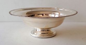 A cased Georgian-style silver compote with gadroon rim on a baize-lined pedestal foot
