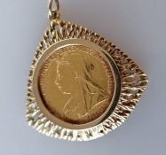 A Victorian gold full sovereign, 1898, Melbourne mint, on a 9ct gold mount, 12.5g