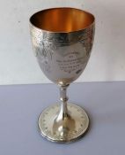 A Victorian silver pedestal goblet with bright-cut engraved with foliate decoration
