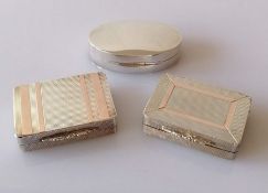 Three cased contemporary silver pill or snuff boxes with gilt interiors