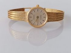 A Tissot ladies quartz watch with baton markers, champagne dial 15mm