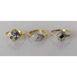 Three Art Deco diamond rings, two with sapphire decoration in yellow gold settings, sizes J, I, O