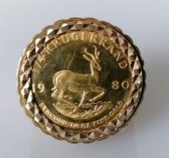 A 1980 1/4 Fine Gold Krugerrand on a 9ct gold ring mount, size V, hallmarked 9ct, 16.26g