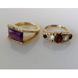 A mid-century amethyst and diamond dress ring on a split 18ct yellow gold shank, size N,