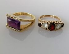 A mid-century amethyst and diamond dress ring on a split 18ct yellow gold shank, size N,