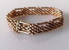 A rose gold gate-link bracelet, 18cm, stamped 9ct, 15.6g