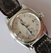 A Rolex Perpetual automatic wristwatch, ref: 2761, circa. 1938 with Arabic numerals, baton markers