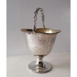 A Victorian silver sugar basket with pierced swing handle