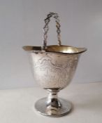 A Victorian silver sugar basket with pierced swing handle