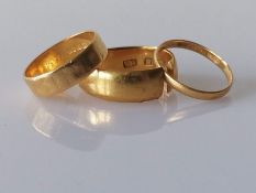 Three 22ct gold wedding bands, one cut, 6,5,2mm, all hallmarked, 10.45g