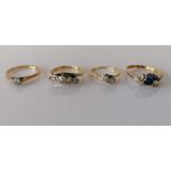 Four mid-20th century 18ct yellow gold and platinum rings