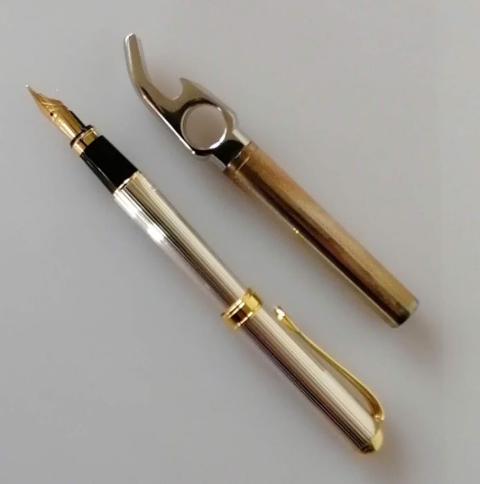 A white and yellow metal fountain pen with iridium point, 11.5 cm with Asprey & Garrard packaging - Image 2 of 3