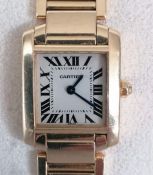 A Cartier Tank Francaise quartz wristwatch in 18ct yellow gold case and bracelet strap, ref. 2385