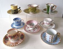 An assortment of eight late 19th/early 20th century cabinet cups and saucers by Coalport, Spode
