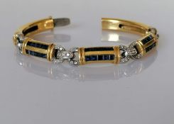 An Italian yellow gold bangle bracelet, the articulated links in white gold and diamonds 