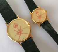 A Kutchinsky his/hers watch set with Oman logo on faces, champagne dials 32, 20mm without crowns