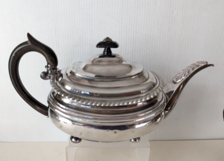 A George III silver teapot with gadrooned rim, acanthus leaf decoration to spout, ebonised handle - Image 2 of 4