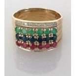 A composition ruby, sapphire and emerald stacking ring with diamond decoration