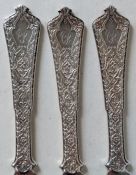 A set of eleven Art Nouveau Tiffany & Co. silver 'Persian' pattern knives, designed by Edward C. Moo