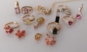 Seven gem-set matching gold earrings and rings on 9ct gold settings and two other pendants