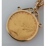 A mounted Victorian shield-back gold sovereign, 1844, on a 9ct gold chain, 58 cm, 25g