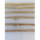 A rose gold neck chain, 40 cm, stamped 585 with box clasp, 3.4g and two yellow gold neck chains