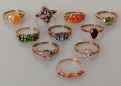 A selection of ten gold gem-set rings, all hallmarked 9ct, mostly sizes N, O, 23g