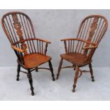 A near pair of 19th century ash and elm high-back Windsor chairs with carved splats