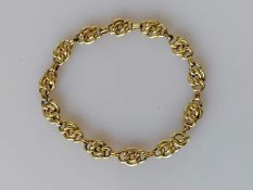 A yellow gold fancy-link bracelet, 19cm, stamped 585, 9.55g