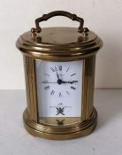 A Matthew Norman quartz brass mantle clock, 12 cm H without handle, needs battery, with original box