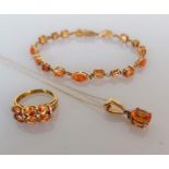 An orange cubic zirconia tennis or line bracelet, 18cm, with matching ring, size O, and pendant chai
