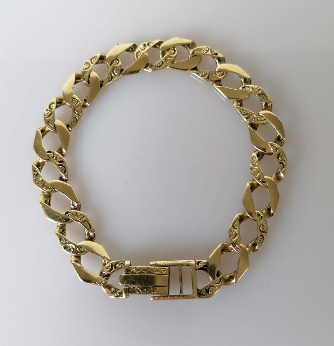 A vintage flat curb-link bracelet with etched decoration and fold over deployment clasp, 19 cm