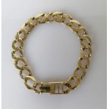 A vintage flat curb-link bracelet with etched decoration and fold over deployment clasp, 19 cm