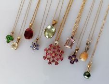 An assortment of ten gem-set gold pendant chains, all hallmarked 9ct, 30g