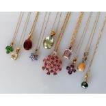 An assortment of ten gem-set gold pendant chains, all hallmarked 9ct, 30g