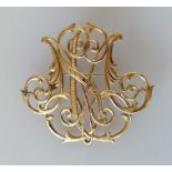 An Edwardian-style carved yellow gold brooch with textured decoration, 45 x 45mm and another