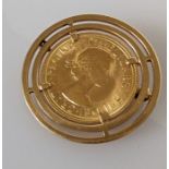 A QEII gold sovereign, 1968, in an 18ct gold mount, 13.6g