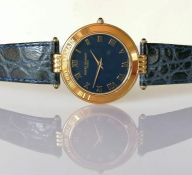 A Pierre Balmain unisex gold-cased quartz watch with black round face, Roman numerals