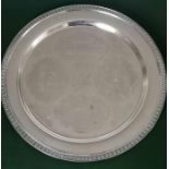 An Oman sterling silver circular presentation tray with etched Oman crest and traditional scenes, 15