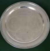 An Oman sterling silver circular presentation tray with etched Oman crest and traditional scenes, 15