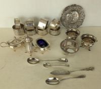 A miscellany of eight silver napkin rings, some initialled; six condiments