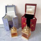 A cased Amouage Cristal  bottle of perfume and one other smaller, both used