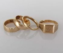 Two 9ct yellow gold wedding bands with etched decoration, both 6mm W; another 3mm