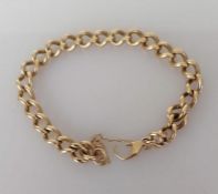 A 9ct yellow gold curb-link bracelet, 16 cm, hallmarked, lobster clasp faulty, 16.2g