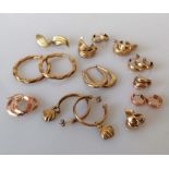 An assortment of twelve pairs of yellow and rose gold earrings, hallmarked, 21g