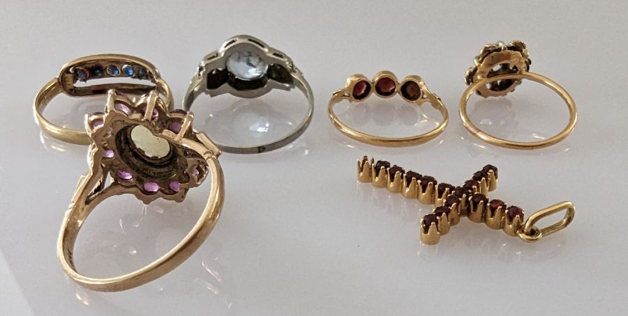 Four gem-set rings stamped or testing for 18ct gold, 8g; a 9ct gold opal and garnet ring - Image 4 of 4