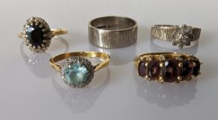 An assortment of five gem-set 18ct yellow and white gold rings, mixed sizes, hallmarked